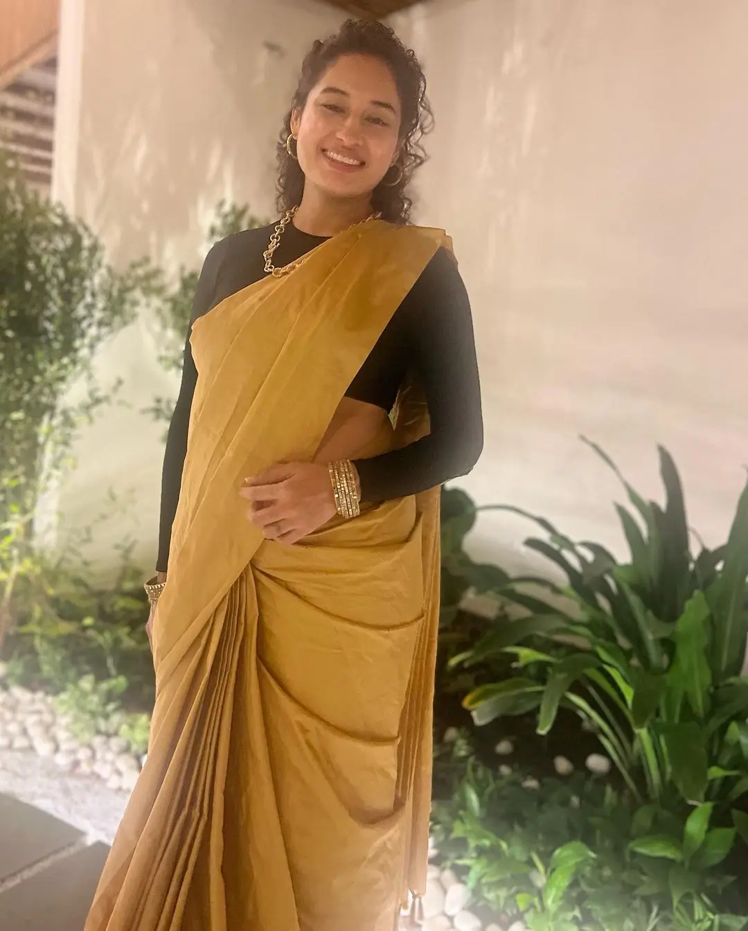 Pooja Ramachandran Stills in Yellow Saree Black Blouse